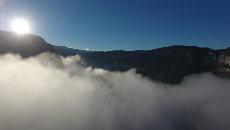Amazing-aerial-shot-over-clouds-discovering-the-Vercors-Massif-in-France.